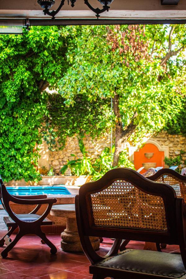 Casa Del Balam Merida Exterior photo A view of the garden