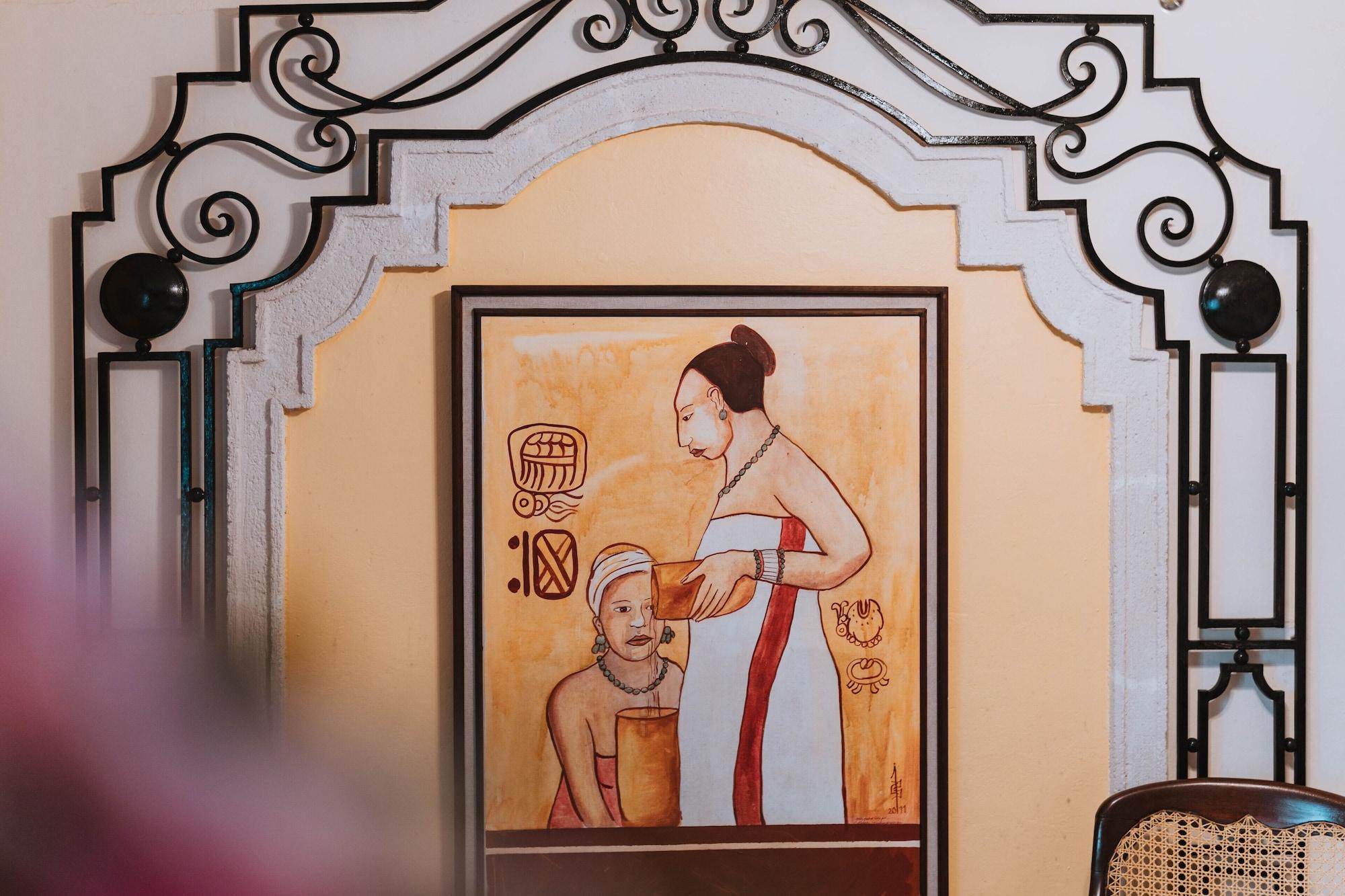 Casa Del Balam Merida Exterior photo Painting of a woman and a child